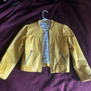 Yellow real leather jacket, has mark on the arm!
